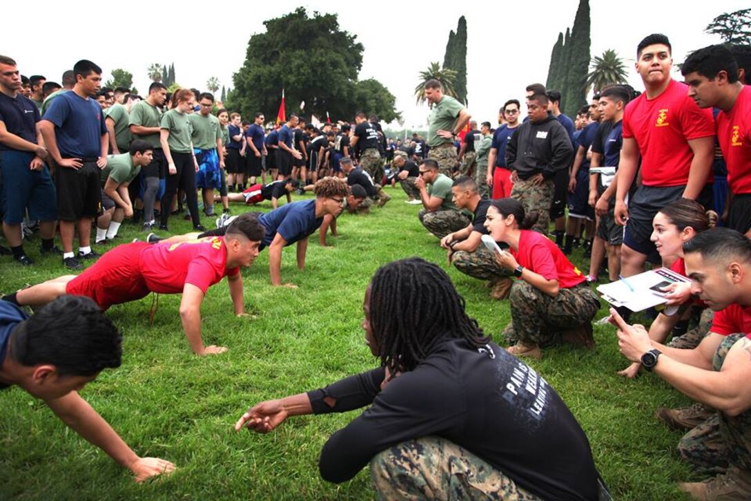 Marine Corps poolees of Recruiting Station Riverside participate in a push-up competition on May 19. Poolees often take part in monthly pool functions to aid in their preparation for Marine Corps Recruit Training.