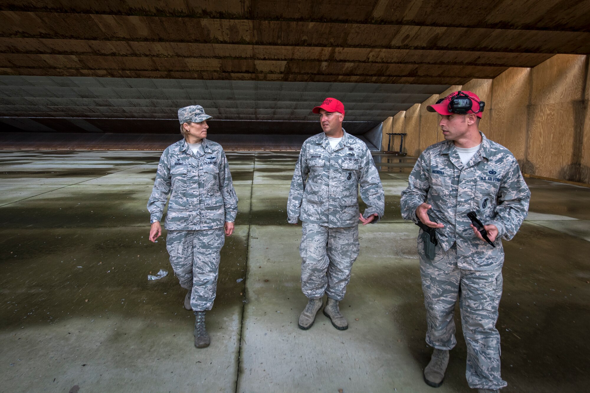 Col. Jennifer Short, 23d Wing commander, speaks with combat arms instructors during an immersion tour, May 21, 2018, at Moody Air Force Base, Ga. Short toured the 23d Mission Support Group (MSG) to gain a better understanding of their overall mission, capabilities, and comprehensive duties. Short was able to meet and interact with Airmen from the combat arms training and maintenance as well as the chemical, biological, radiological and nuclear defense sections of the MSG. (U.S. Air Force photo by Airman 1st Class Eugene Oliver)