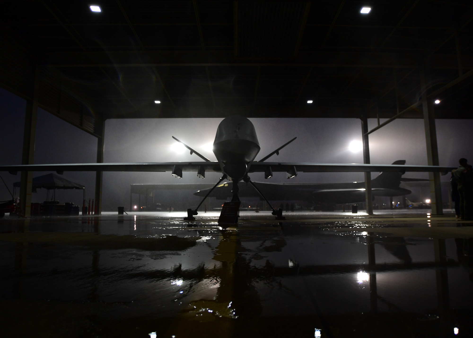 The MQ-9 Reaper sits on display at the Airpower Over Hampton Roads air show at Joint Base Langley-Eustis, Virginia, May 19, 2018. This air show marked the first time that an MQ-9 has been to Air Combat Command headquarters alongside the many other aircraft Reaper aircrews integrated with on a daily basis to execute the mission. (U.S. Air Force photo by Senior Airman Christian Clausen)