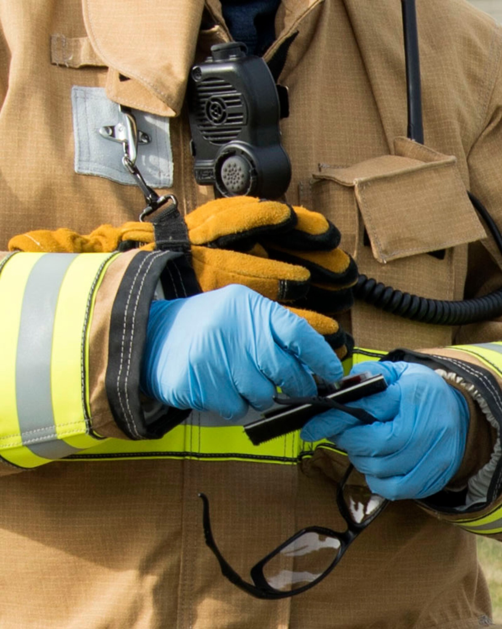Airman 1st Class Alec Cagle, a 673d Civil Engineer Squadron (CES) firefighter, counts people present during an active-shooter exercise at Joint Base Elmendorf-Richardson, Alaska, May 17, 2018. The 673d CES participated in an exercise in preparations for the Arctic Thunder Open House scheduled to take place June 30 and July 1. The exercise is used to prepare for possible real-world scenarios. The Airmen were given feedback and an opportunity to learn from the scenario at the end of the exercise.