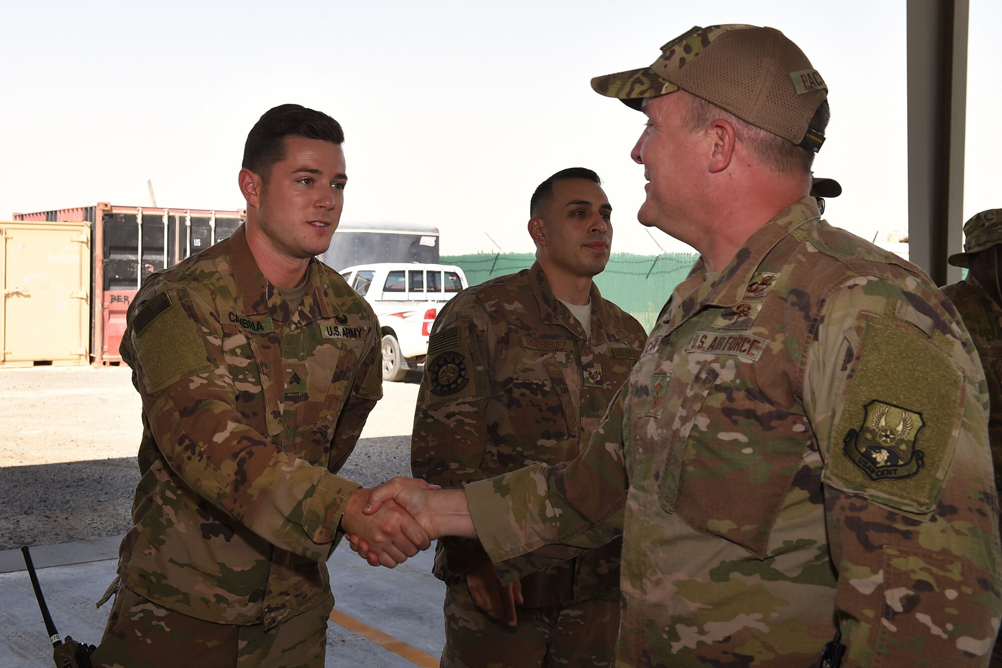 Chief shakes hands with U.S. Army Solider