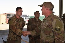 Chief shakes hands with U.S. Army Solider