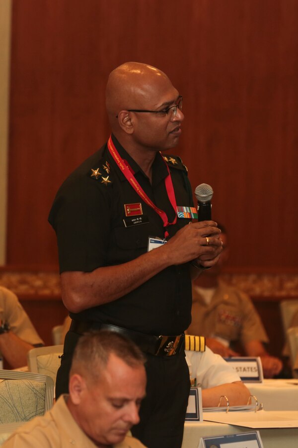 Indian Brigadier Arun Chaloli Gopinath, commander, Infantry Brigade India, asks a question during the Pacific Amphibious Leaders Symposium (PALS) 2018 in Honolulu, Hawaii, May 22, 2018. PALS brings together senior leaders of allied and partner militaries with significant interest in the security and stability of the Indo-Pacific region to discuss key aspects of maritime/amphibious operations, capability development, crisis response and interoperability. (U.S. Marine Corps photo by Cpl. Patrick Mahoney)