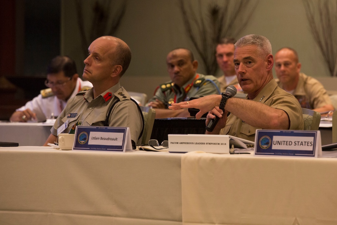 U.S. Marine Corps Lt. Gen. Brian Beaudreault, deputy commandant, Plans, Policies, and Operations, Headquarters Marine Corps, asks a question during the Pacific Amphibious Leaders Symposium (PALS) 2018 in Honolulu, Hawaii, May 22, 2018. PALS brings together senior leaders of allied and partner militaries with significant interest in the security and stability of the Indo-Pacific region to discuss key aspects of maritime/amphibious operations, capability development, crisis response, and interoperability. (U.S. Marine Corps photo by photo Cpl. Makenzie Fallon)
