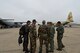 Royal Moroccan Armed Forces service members and U.S. Air Force Tech Sgt. Ronald Orr, 37th Airlift Squadron loadmaster, center, briefs prior to a combat offload training for Exercise African Lion 18, April 23, 2018 at Kenitra Air Base, Morocco.