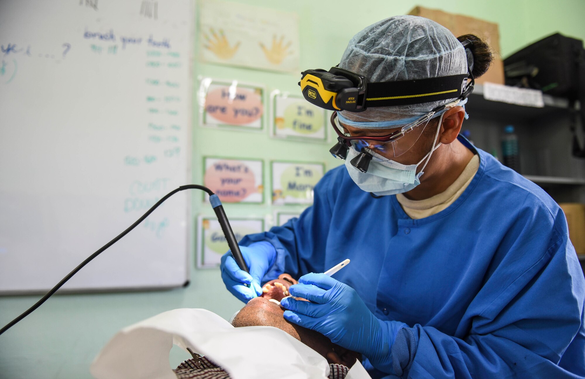 U.S. Air Force Master Sgt. Emeriles Curry, 346th Expeditionary Medical Operations Squadron dental hygienist, provides dental care to a local man, May 11, 2018 in the Coclé Province of Panama. So far, in 2-weeks’ worth of Medical Readiness Training Exercises the teams, working in conjunction with the Panamanian Ministry of Health, have seen nearly 4,700 patients and 502 animals. The medical team is participating in Exercise New Horizons 2018, which is a joint training exercise focused on civil engineer, medical, and support service personnel’s ability to prepare, deploy, operate, and redeploy outside the United States. (U.S. Air Force photo by Senior Airman Dustin Mullen)