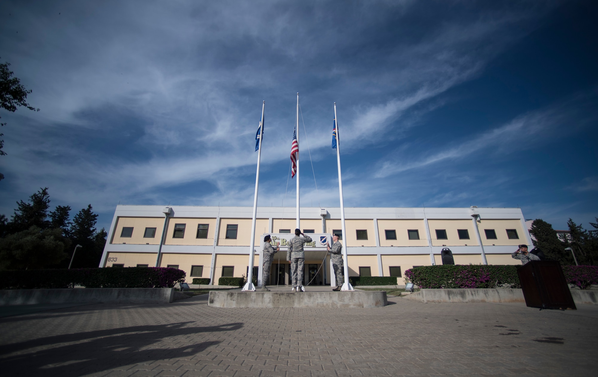 Airmen prepare to take down American Flag during retreat ceremony