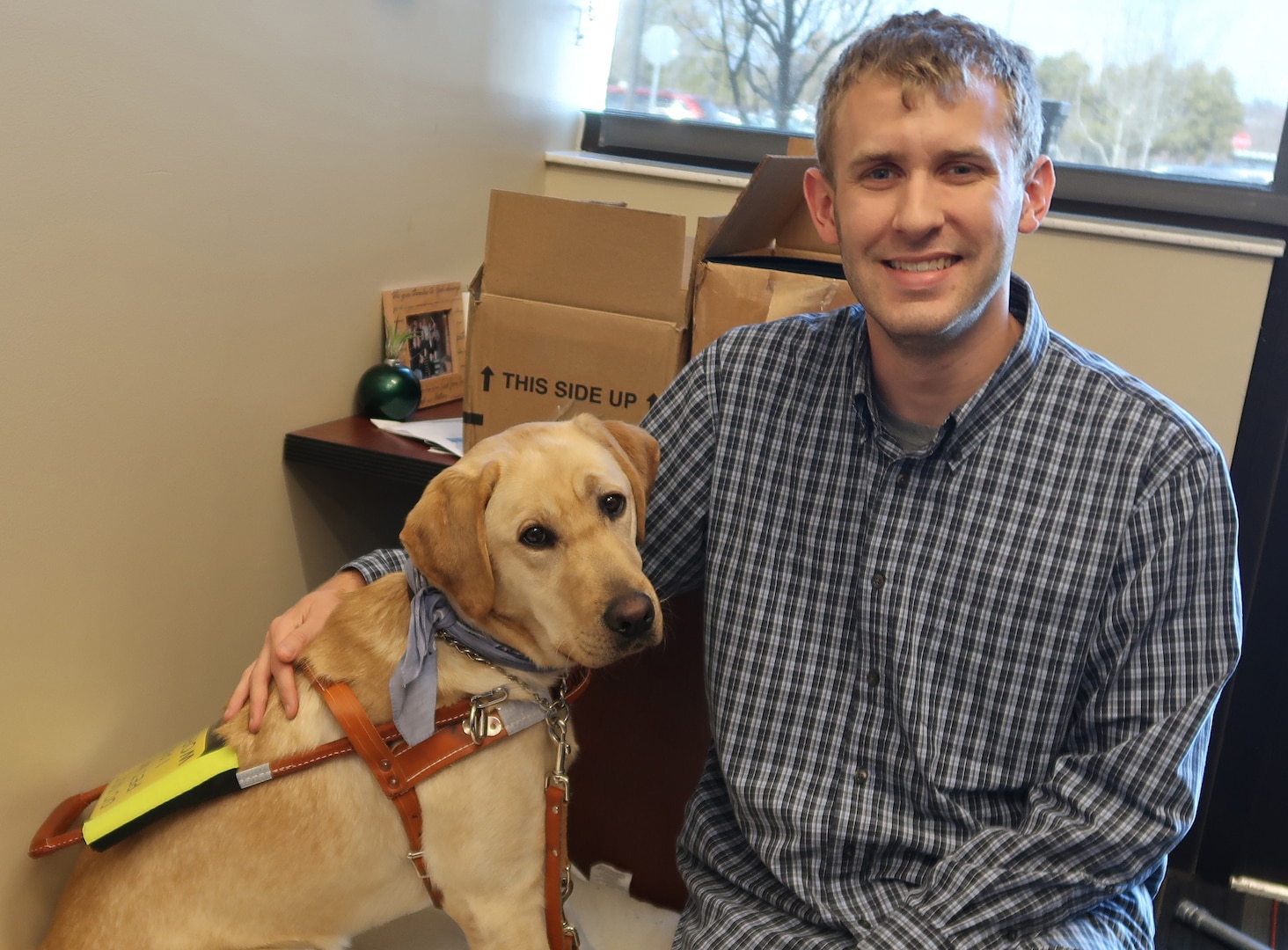 Man’s best friend: Distribution employee’s daily life enhanced by guide dog