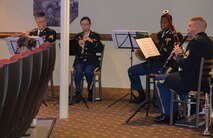 The U.S. Army Training and Doctrine Command Band ensemble performs a musical selection during the Bronze Cross Memorial and Wreath Laying Ceremony at Wylie Theater at Joint Base Langley-Eustis, Virginia, May 19, 2018. The ceremony featured the playing of Taps and a final salute to honor, remember and pay respects to fallen brothers and sisters in arms. (U.S. Air Force photo by Beverly Joyner)