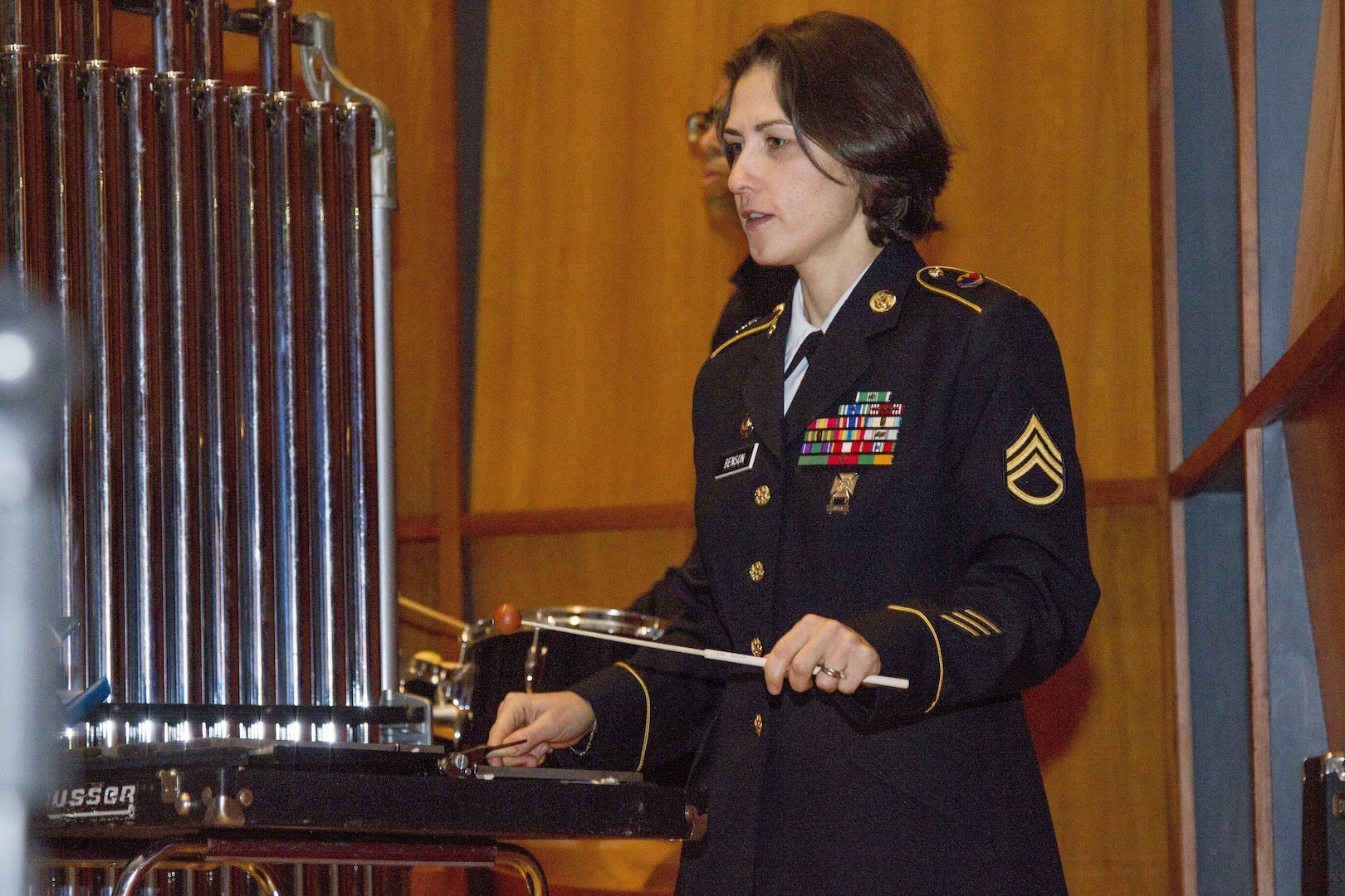 U.S. Army Staff Sgt. Yulia Benson, bandsman, 40th Army Band, Vermont Army National Guard plays during a concert.