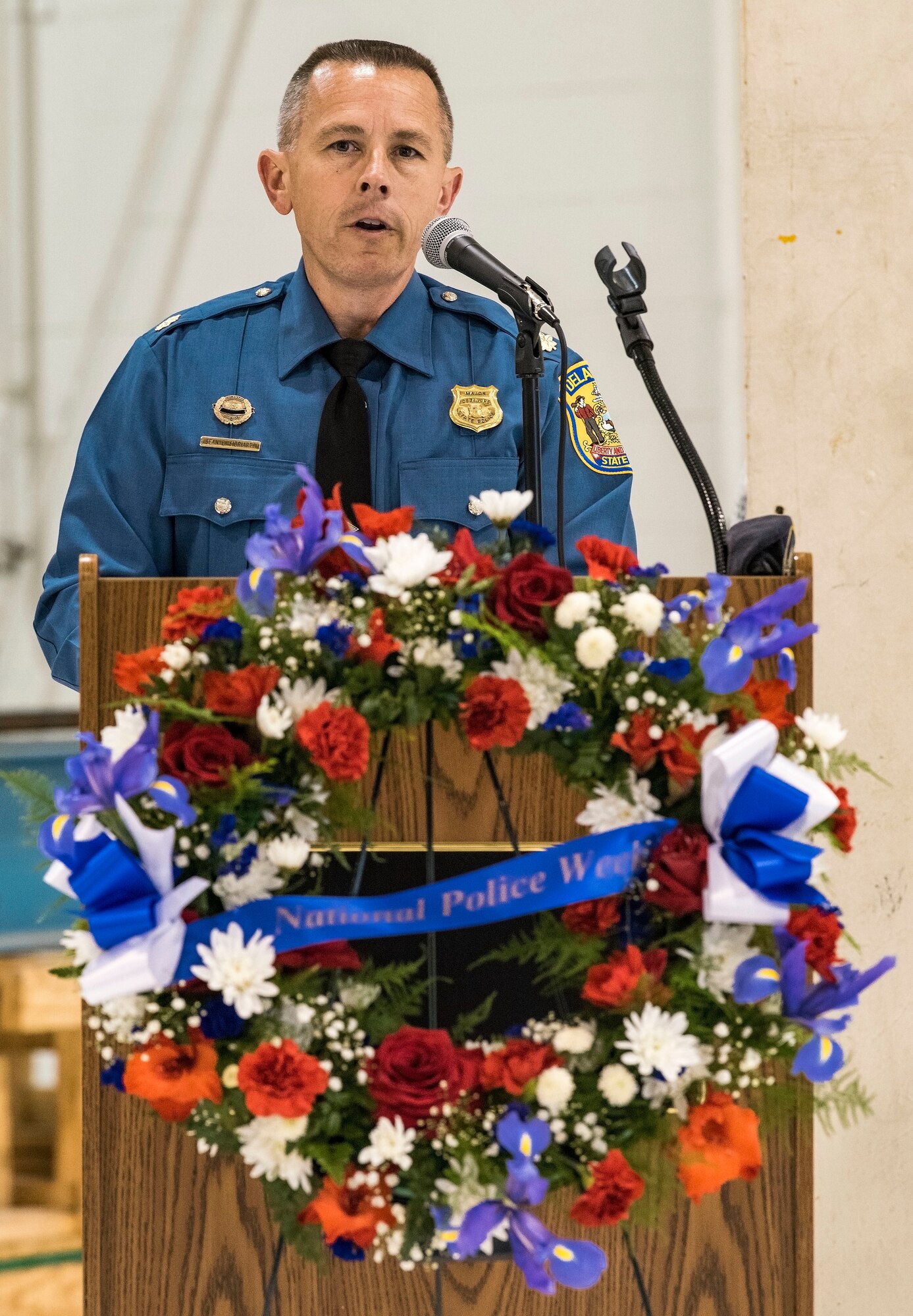 Maj. Sean Moriarty, Delaware State Police operations officer for Delaware’s Kent and Sussex Counties, speaks to attendees at the National Police Week Remembrance Ceremony May 18, 2018, at Dover Air Force Base, Del. The 436th Security Forces Squadron hosted numerous events in recognition of National Police Week. (U.S. Air Force photo by Roland Balik)