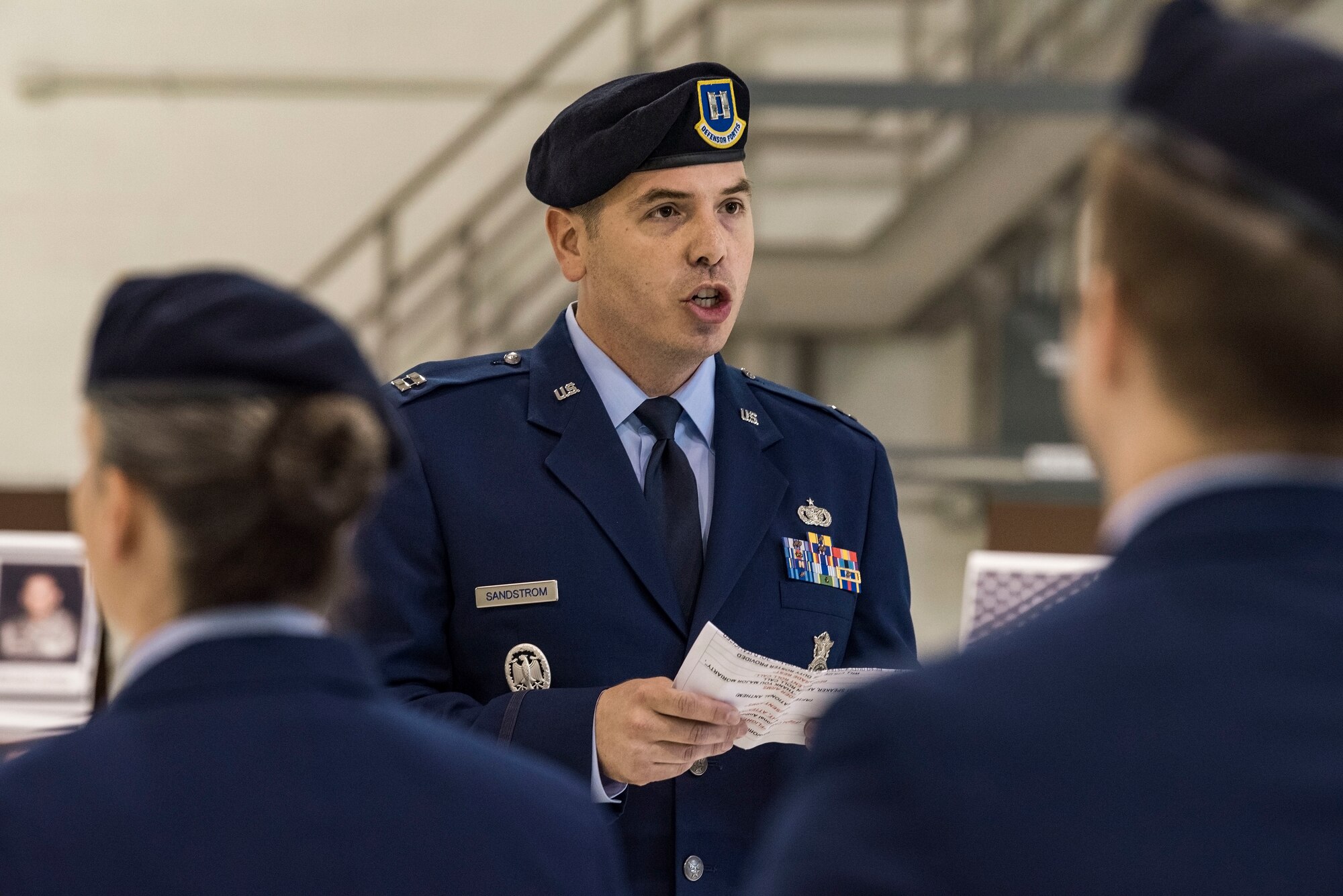 Capt. Jesse Sandstrom, 436th Security Forces Squadron operations officer, reads a duty roster in remembrance of 14 fallen Air Force security forces members May 18, 2018, during the National Police Week Remembrance Ceremony at Dover Air Force Base, Del. Sandstrom called out each name three times in succession prior to the emcee reading a brief narration of their untimely death in the line of duty. (U.S. Air Force photo by Roland Balik)
