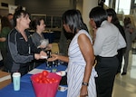 Staff from the HQC Fitness Center offer information on the facility's fitness offerings at the annual Health and Safety Expo. Photo by Teodora Mocanu