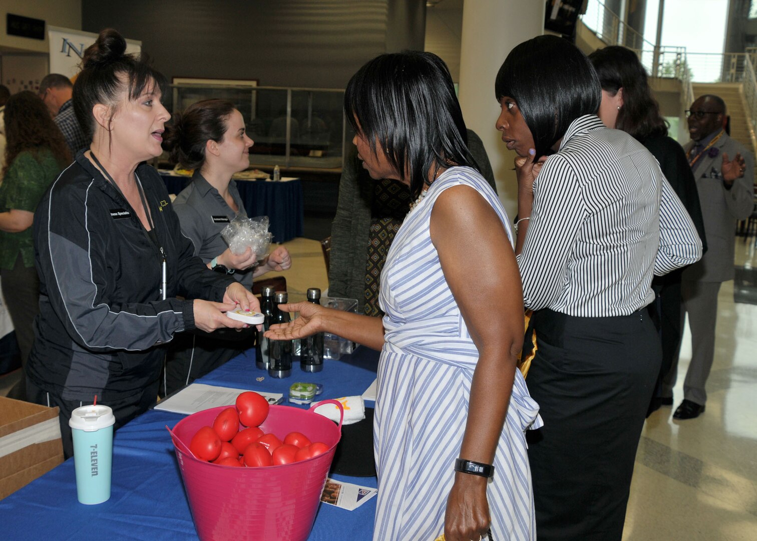 Staff from the HQC Fitness Center offer information on the facility's fitness offerings at the annual Health and Safety Expo. Photo by Teodora Mocanu