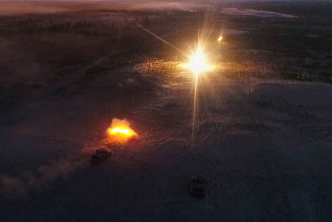 Marines with Bravo Company, 4th Tanks Battalion, fire a M1A1 Abrams tank during a low-light live-fire exercise as part of Exercise Arrow 18 in Pohjankangas Training Area near Kankaanpaa, Finland, May 16, 2018. Exercise Arrow is an annual Finnish multi-national exercise with the purpose of training with mechanized infantry, artillery, and mortar field training skills in a live-fire exercise. This is the first year the Marine Corps is participating in this exercise and the first time the M1A1 Abrams tanks have been in Finland. (U.S. Marine Corps photo by Staff Sgt. Marcin Platek/Released)