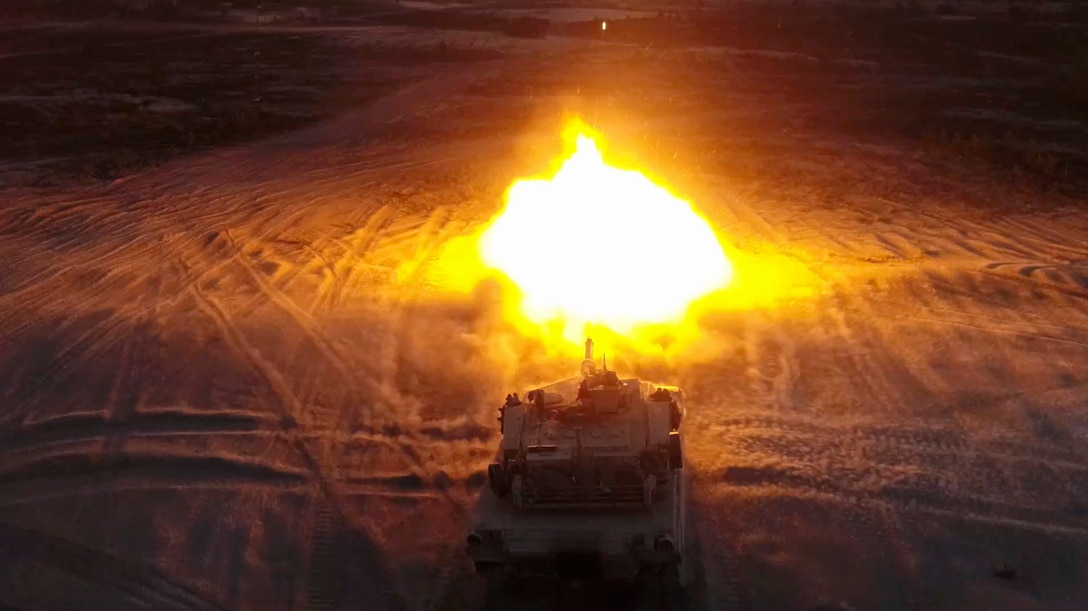 Marines with Bravo Company, 4th Tanks Battalion, fire a M1A1 Abrams tank during a low-light live-fire exercise as part of Exercise Arrow 18 in Pohjankangas Training Area near Kankaanpaa, Finland, May 16, 2018. Exercise Arrow is an annual Finnish multi-national exercise with the purpose of training with mechanized infantry, artillery, and mortar field training skills in a live-fire exercise. This is the first year the Marine Corps is participating in this exercise and the first time the M1A1 Abrams tanks have been in Finland. (U.S. Marine Corps photo by Staff Sgt. Marcin Platek/Released)