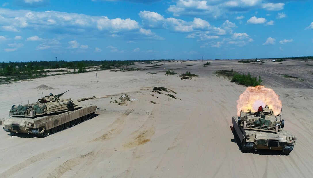 Marines with Bravo Company, 4th Tanks Battalion, fire the M1A1 Abrams tanks during a live-fire exercise as part of Exercise Arrow 18 in Pohjankangas Training Area near Kankaanpaa, Finland, May 16, 2018. Exercise Arrow is an annual Finnish multi-national exercise with the purpose of training with mechanized infantry, artillery, and mortar field training skills in a live-fire exercise. This is the first year the Marine Corps is participating in this exercise and the first time the M1A1 Abrams tanks have been in Finland. (U.S. Marine Corps photo by Staff Sgt. Marcin Platek/Released)