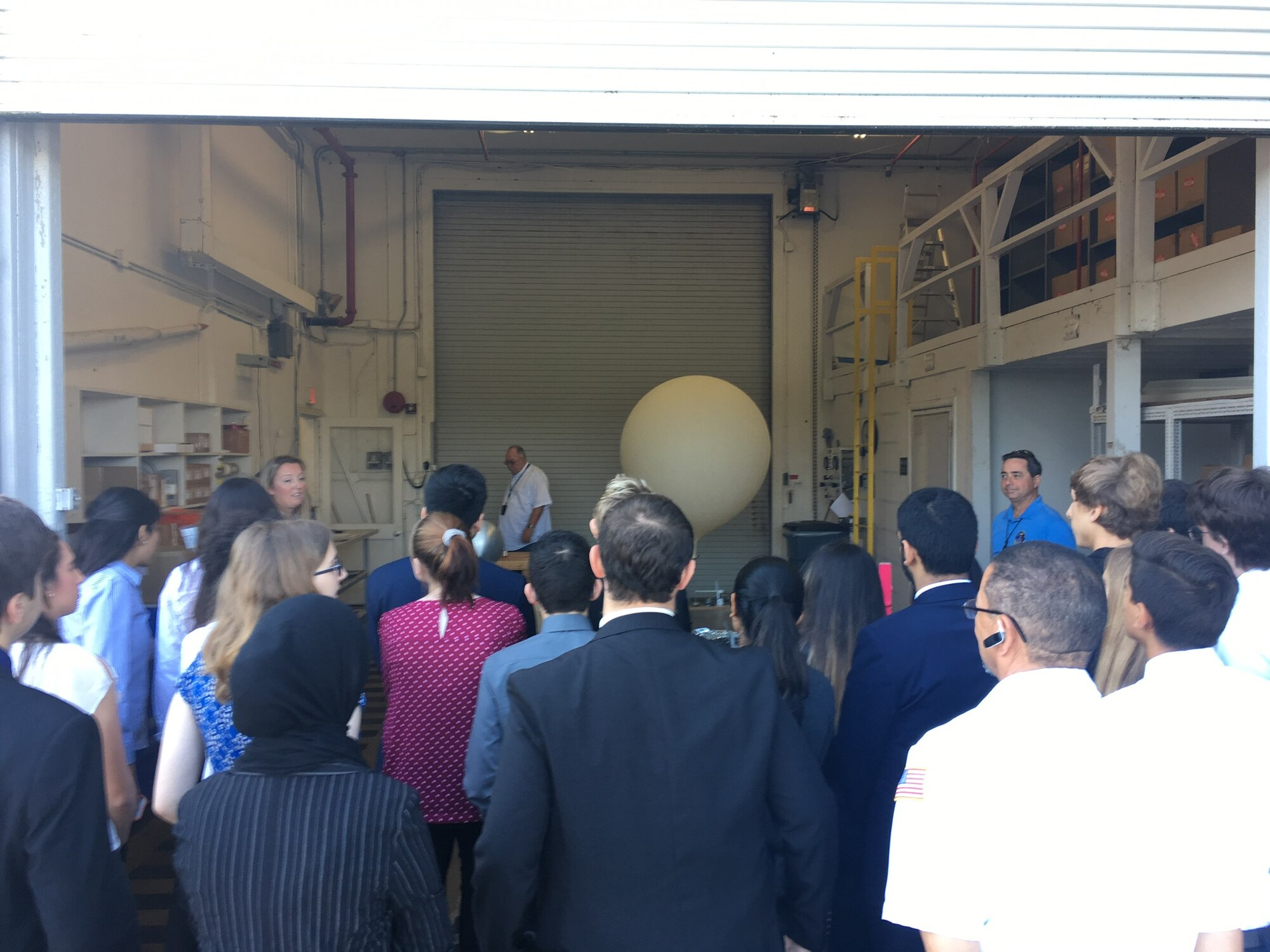 Students from Lake Nona High School attend a briefing from the 45th Weather Squadron, April 27, 2018 at Cape Canaveral Air Force Station, Fla. Students from Lake Nona High School have collaborated in research with the 45th Weather Squadron for three years. (U.S. Air Force photo by 45th Space Wing Public Affairs)