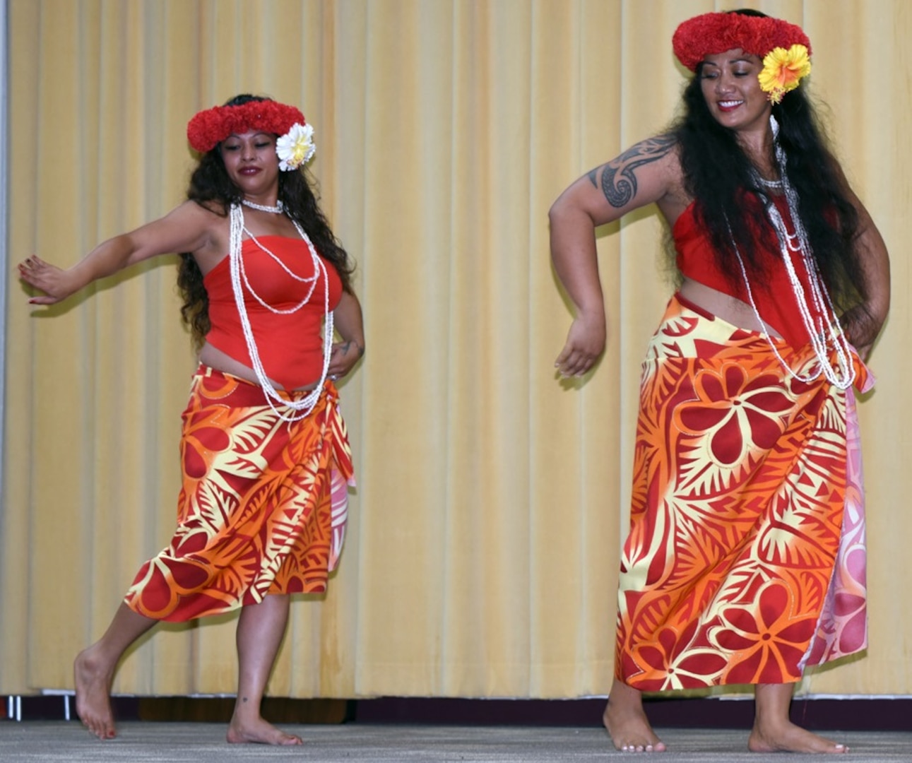 The Desert Polynesia Dance Troupe performing a traditional dance at the Asian American and Pacific Islander Heritage Month Commemoration for Joint Base San Antonio at Blesse Auditorium at JBSA-Fort Sam Houston May 22.