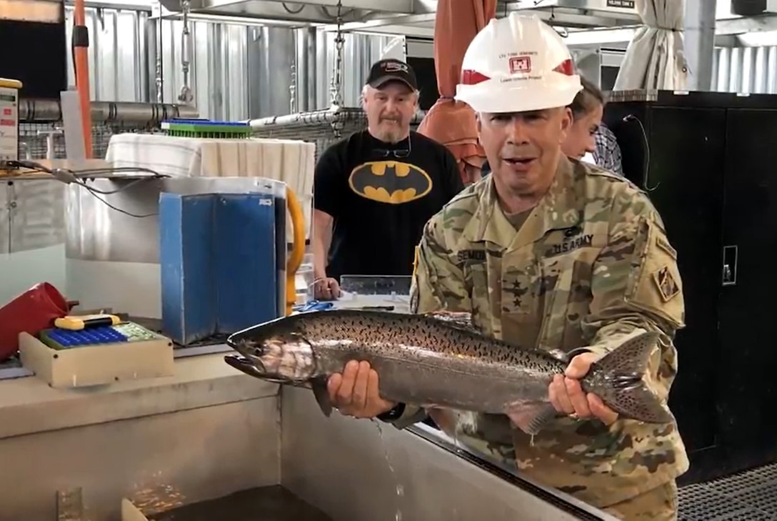 Lt. Gen. Todd Semonite discusses efforts underway at the Lower Granite Lock and Dam with Walla Walla District Commander Lt. Col. Damon Delarosa and biologist Elizabeth Holdren.