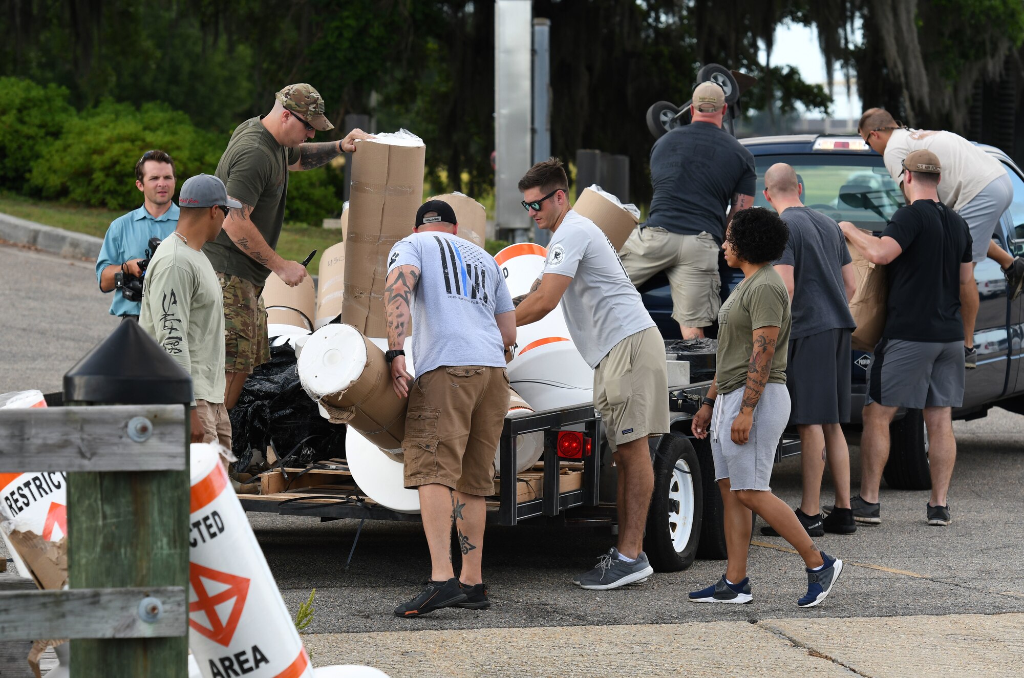 Members of the 81st Security Forces Squadron unload restricted area buoys and anchors at The Marina at Keesler Air Force Base, Mississippi, May 23, 2018. Keesler and the Department of Marine Resources partnered to install 15 buoys in the Biloxi Back Bay 150 feet from the Keesler shore line as an added base security measure. This project took almost two years of research and coordination with the 81st SFS Anti-terrorism Office, 81st Training Wing Legal Office, the state of Mississippi as well as the Army Corps of Engineers in Washington, D.C. (U.S. Air Force photo by Kemberly Groue)