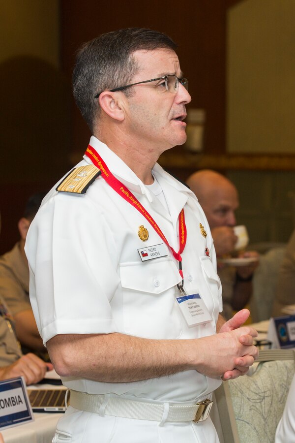 Chilean Marine Corps Rear Adm. Pedro Abrego Martinez, commanding general, Chilean Marine Corps, asks a question during the Pacific Amphibious Leaders Symposium (PALS) 2018 in Honolulu, Hawaii, May 23, 2018. The purpose of PALS is to bring together senior leaders of allied and partner militaries with an interest in amphibious operations and capability development in order to foster stability and prosperity in the Indo-Pacific region. (U.S. Marine Corps photo by Cpl. Patrick Mahoney)