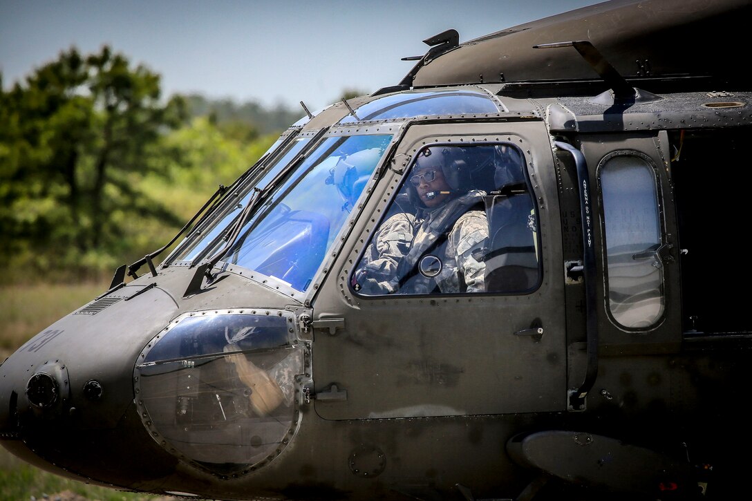 An Army pilot taxis his UH-60L Black Hawk helicopter before takeoff.