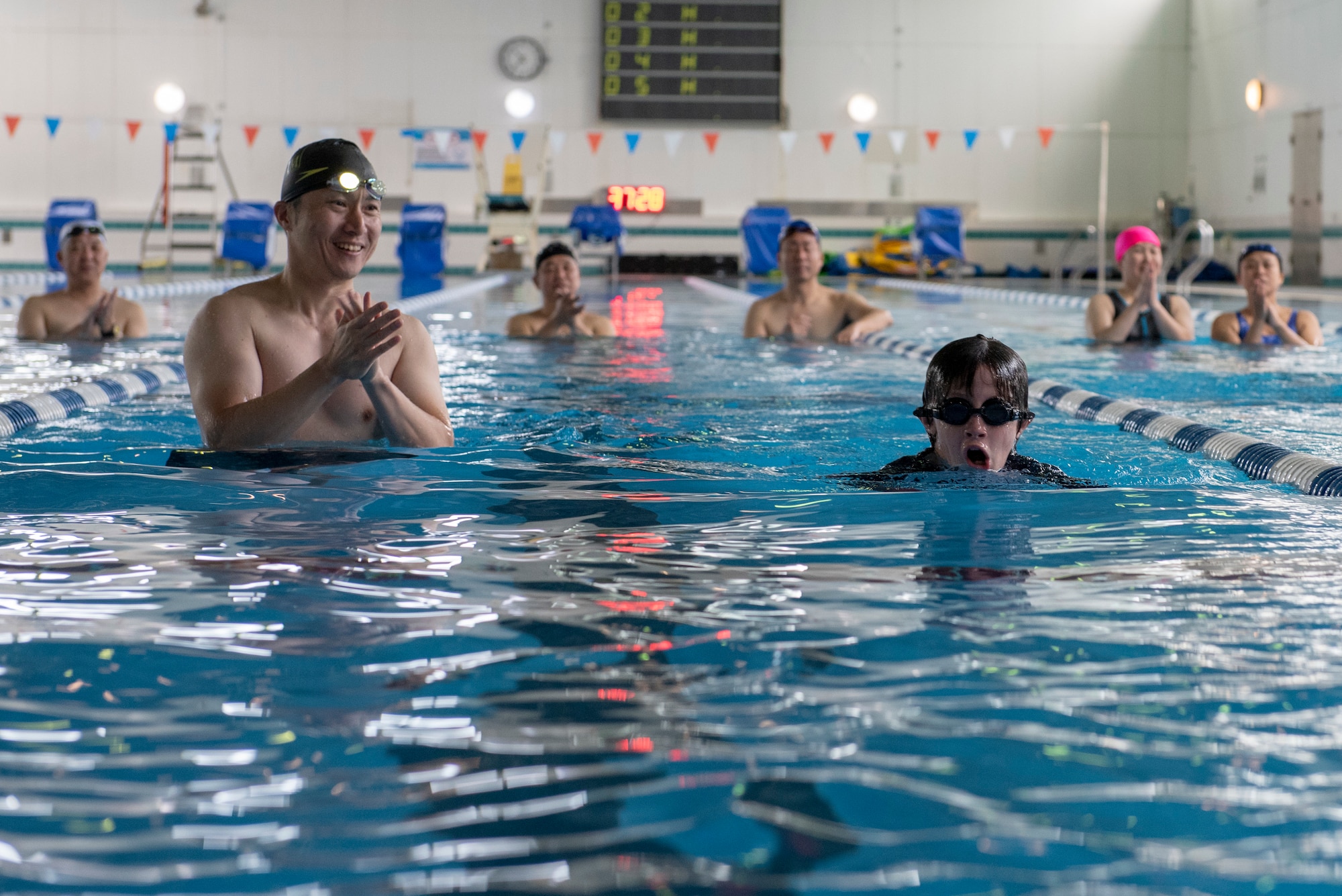 An athlete pops up for air during the 15 meter breaststroke during the Kanto Plains Special Olympics at Yokota Air Base, Japan, May 19, 2018.