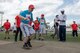 An athlete lands in the sand during the standing long jump competition of the Kanto Plains Special Olympics at Yokota Air Base, Japan, May 19, 2018.