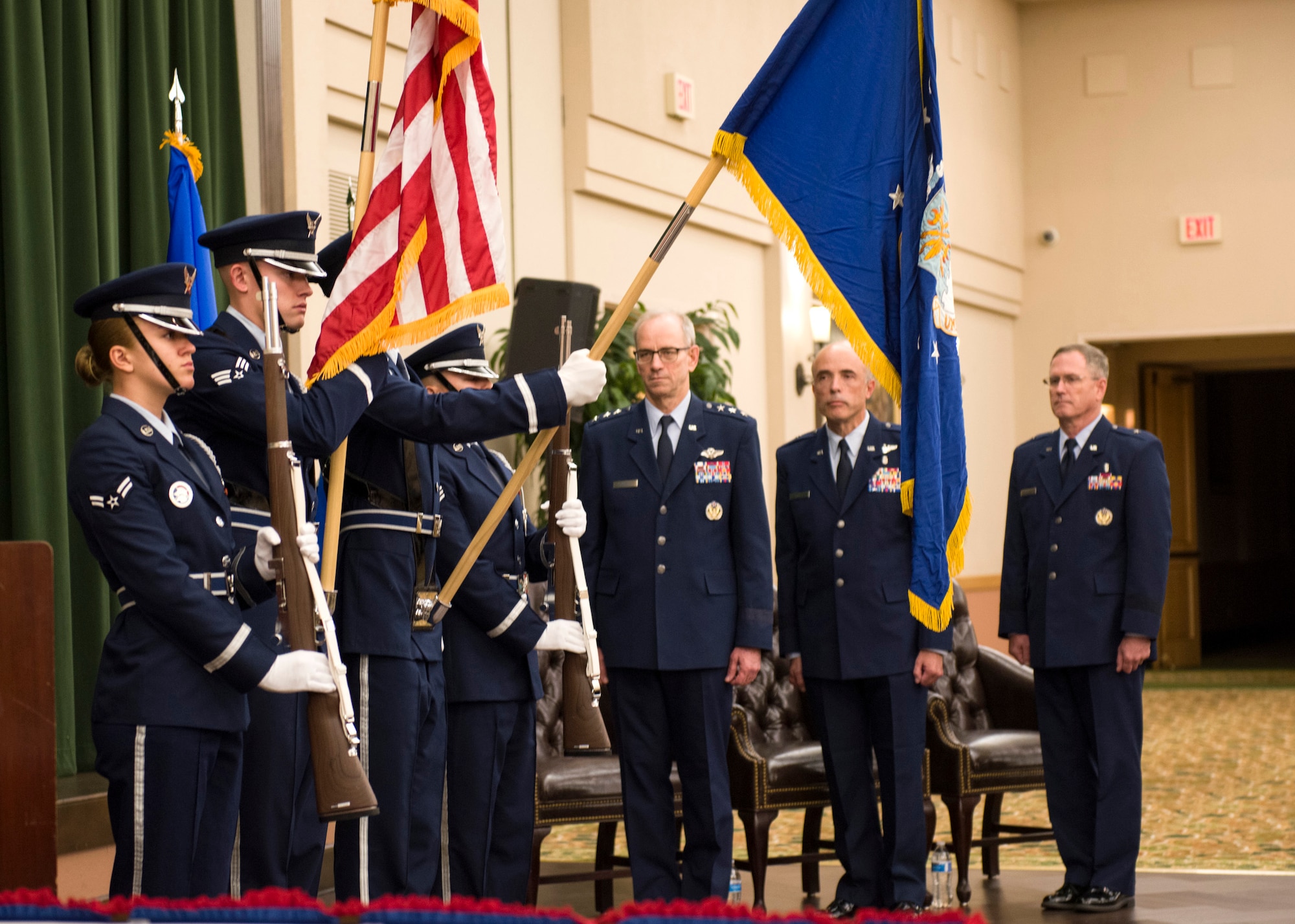 (From center to right) Lt. Gen. Mark A. Ediger, U.S. Air Force Surgeon General, Brig. Gen. (Dr.) Robert I. Miller, and Brig. Gen. James H. Dienst await the posting of the colors during the Air Force Medical Operations Agency (AFMOA) change of command at Joint Base San Antonio-Lackland, Texas, May 22, 2018. AFMOA oversees the execution of Air Force expeditionary capabilities and healthcare operations. Miller relinquished command of AFMOA to Dienst. (U.S. Air Force photo by Staff Sgt. Kevin Iinuma)