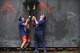 Airmen from the 1st Combat Communications Squadron lift one another over a wall during the 2018 Ramstein Mudder, May 24 at Ramstein Air Base, Germany. More than 200 Kaiserslautern Military Community Members ran the 2.5 mile obstacle course for the 86th Airlift Wing’s resilience day. (U.S. Air Force photo by Staff Sgt. Nesha Humes Stanton)