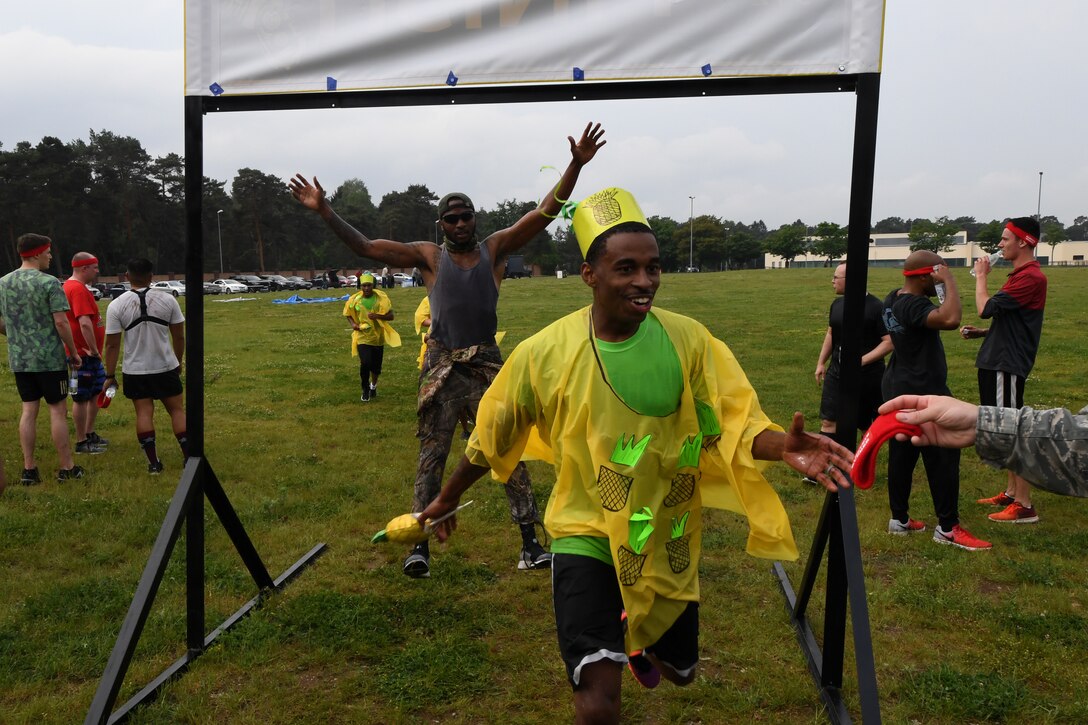 Kaiserslautern Military Community members run an obstacle course during the 2018 Ramstein Mudder, May 24 at Ramstein Air Base, Germany. This is the fifth year the 86th Airlift Wing has hosted the obstacle course for their annual resilience day. (U.S. Air Force photo by Staff Sgt. Nesha Humes Stanton)