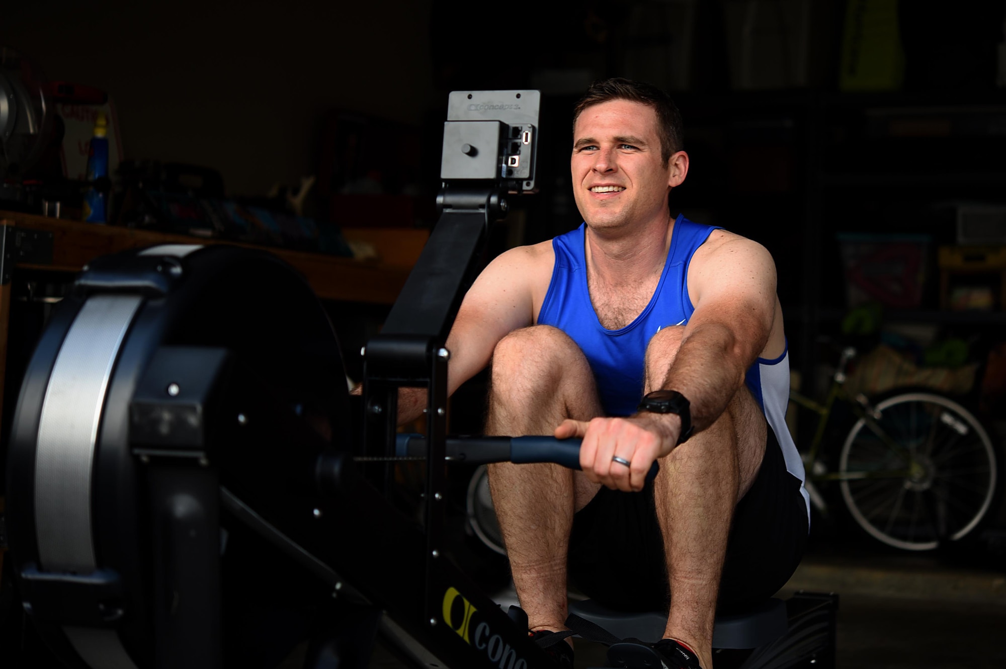 Capt. Hunter Barnhill, 37th Flying Training Squadron instructor pilot, completes a rep on his rowing machine May 15, 2018, on Columbus Air Force Base, Mississippi. Barnhill was diagnosed with brain cancer in 2017, and has since become one of the many resilient Airmen and participants in the Air Force Wounded Warrior community. (U.S. Air Force photo by Airman 1st Class Keith Holcomb)
