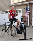 Capt. Hunter Barnhill, 37th Flying Training Squadron instructor pilot, stands with his training equipment May 15, 2018, on Columbus Air Force Base, Mississippi. Barnhill qualified for the Air Force Wounded Warrior team in the shooting, cycling and indoor rowing events. He will be competing in all three events at the 2018 Warrior Games June 1-9 at the U.S. Air Force Academy in Colorado Springs, Colorado. (U.S. Air Force photo by Airman 1st Class Keith Holcomb)