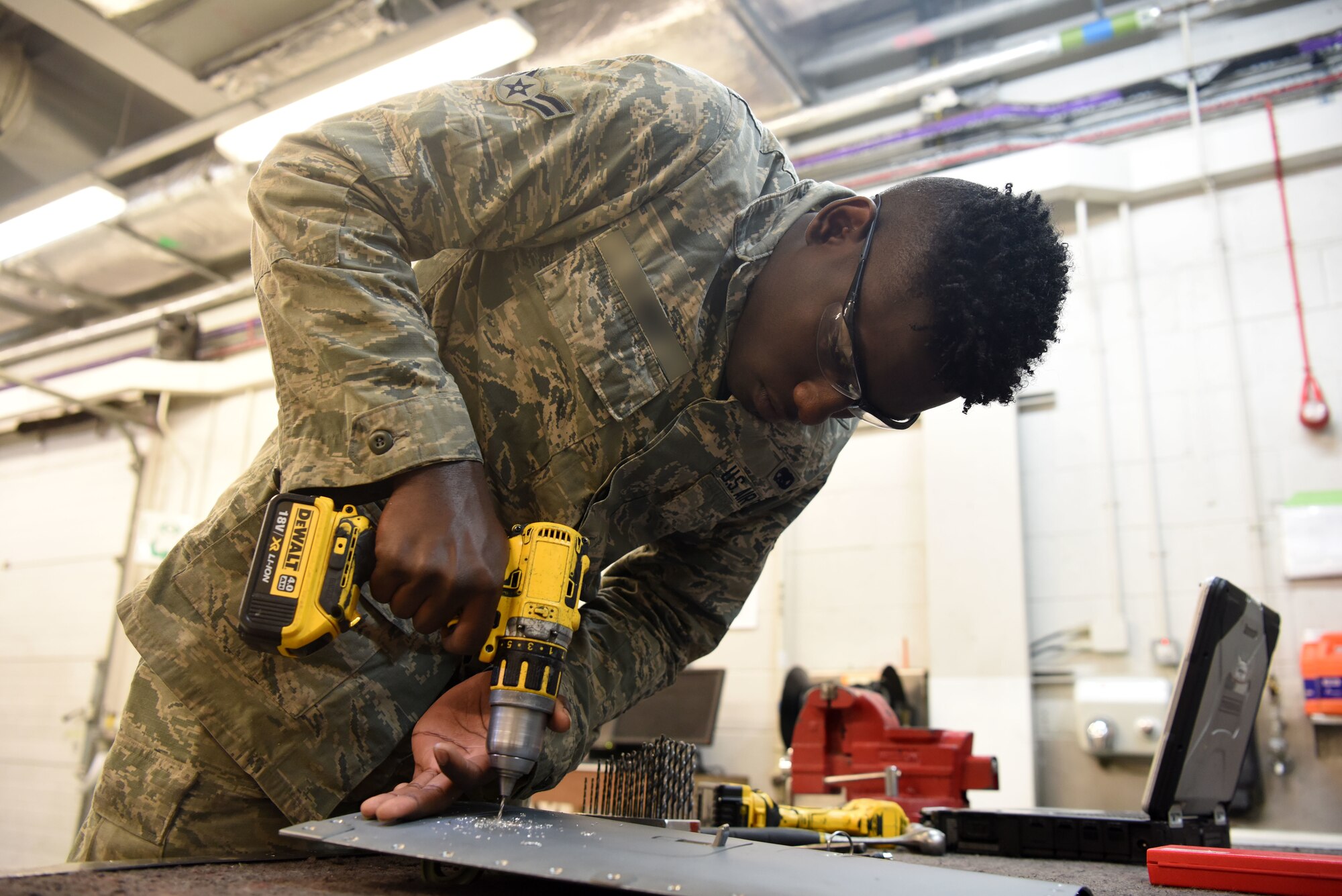 A 48th Aircraft Structural Maintenance Airman drills out a rivet on a side panel at Royal Air Force Lakenheath, England, May 22, 2018. Aircraft Structural Maintainers are responsible for either repairing lightly damaged components and returning them to flyable status or fabricating replacement pieces for more damaged components.