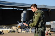 Royal Canadian Air Force pilot Capt. Hamilton, 433rd Tactical Fighter Squadron, performs pre-flight inspections May 3, 2018, at Hill Air Force Base, Utah. The Canadian unit participated in a Weapons System Evaluation Program, or WSEP, exercise conducted by the 86th Fighter Weapons Squadron, a Hill tenant unit. (U.S. Air Force photo by R. Nial Bradshaw)