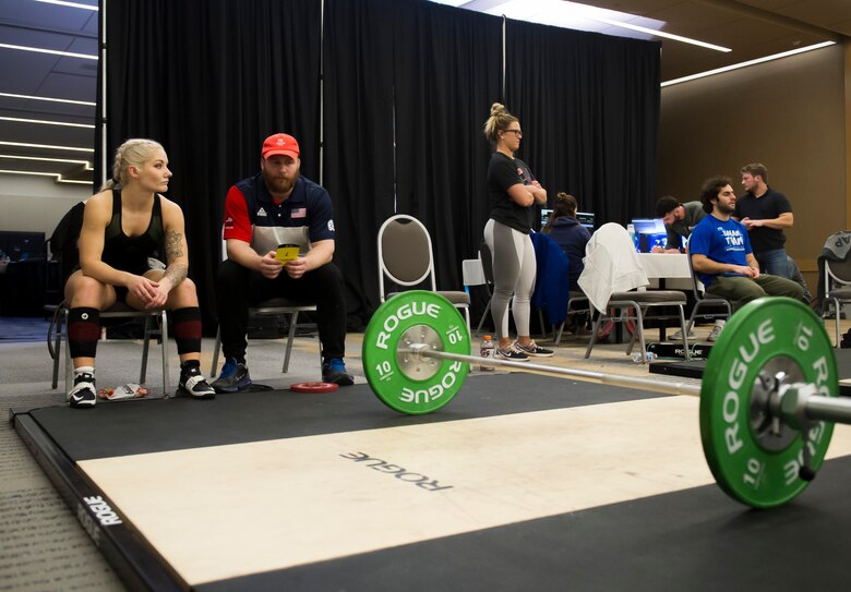 Staff Sgt. Bailey Jewell, a compliance assessor with the National Air and Space Intelligence Center Inspector General’s office, sits with her coach and waits to be called on stage during the Arnold Sports Festival March 1, 2018 at the Greater Columbus Convention Center in Columbus, Ohio. Jewell was raised around sports and contributes her active lifestyle to her father who coached football for Jewell’s entire life. (U.S. Air Force photo/Senior Airman Jonathan Stefanko)