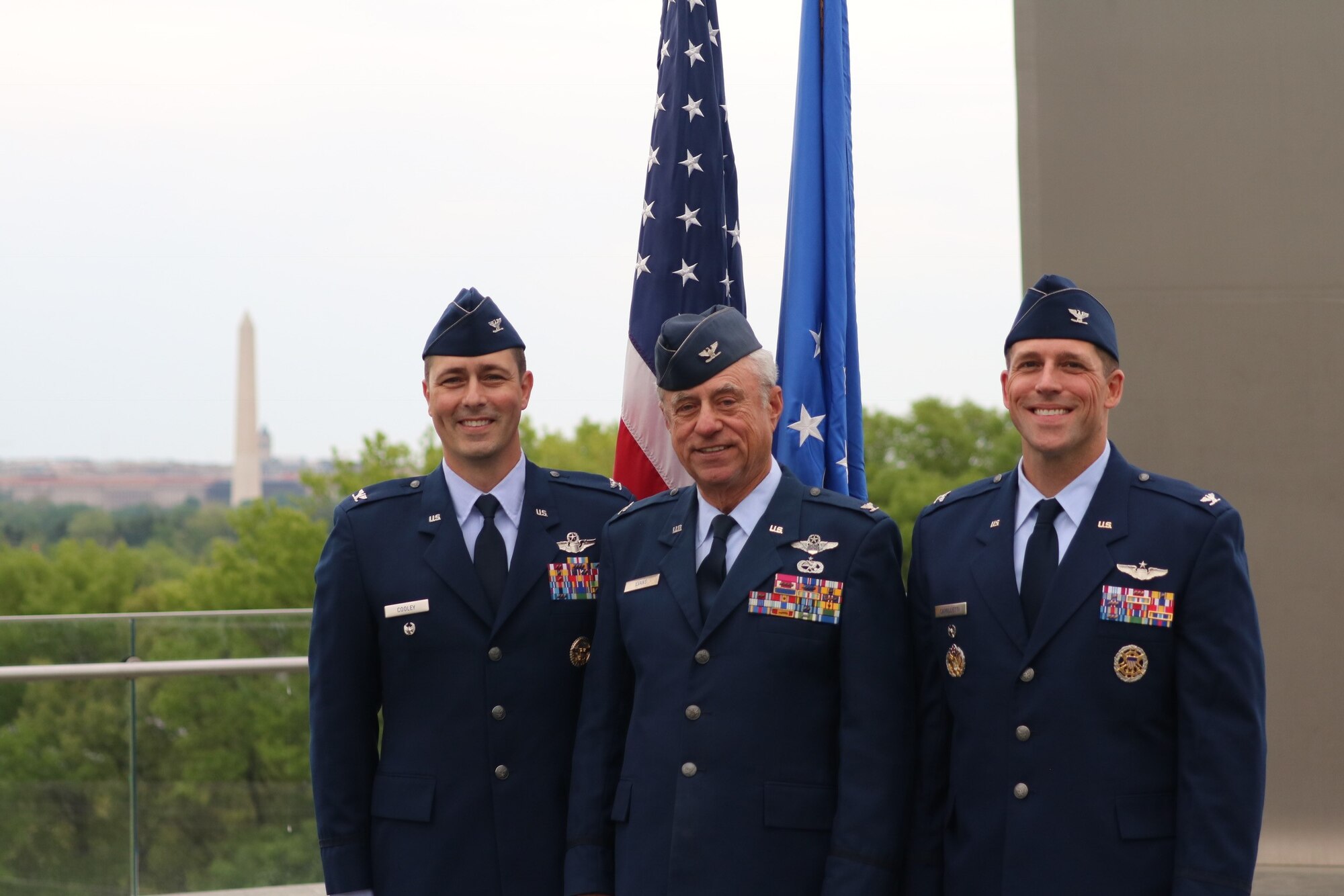 Col. Dan Cooley, a National War College student at Ft. McNair, D.C., and Col. Jason Camilletti, a Marine Corps War College student in Quantico, Va., pause for a photo following their shared promotion.