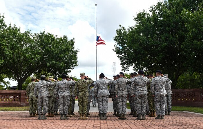 Service members stand in formation during a retreat ceremony May 18, 2018, at Joint Base Charleston, S.C.