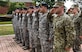 Service members salute the U.S. flag during a retreat ceremony May 18, 2018, at Joint Base Charleston, S.C.