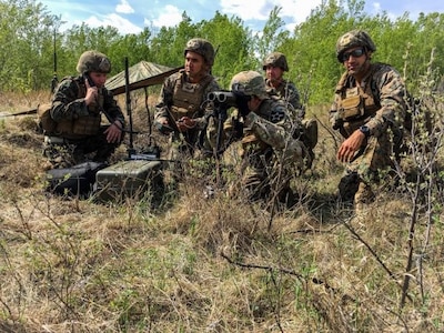 U.S. Army artillerymen from 2nd Stryker Brigade Combat Team, Joint Base Lewis-McChord, Wash., conduct interoperability training with U.S. Marine Forward Observers from the 6th Air Naval Gunfire Liaison Company as part of Exercise Maple Resolve 18-01, Canadian Forces Base, Wainwright, Alberta, Canada. Maple Resolve is an allied exercise involving U.S. and Canadian militaries, as well as personnel from Great Britain, Australia, and France. The annual exercise identifies interoperability issues between the forces and allows the partner nations to overcome them during training. (Photo by 2nd Lt. Eric-James Estrada) (Photo Credit: U.S. Army)