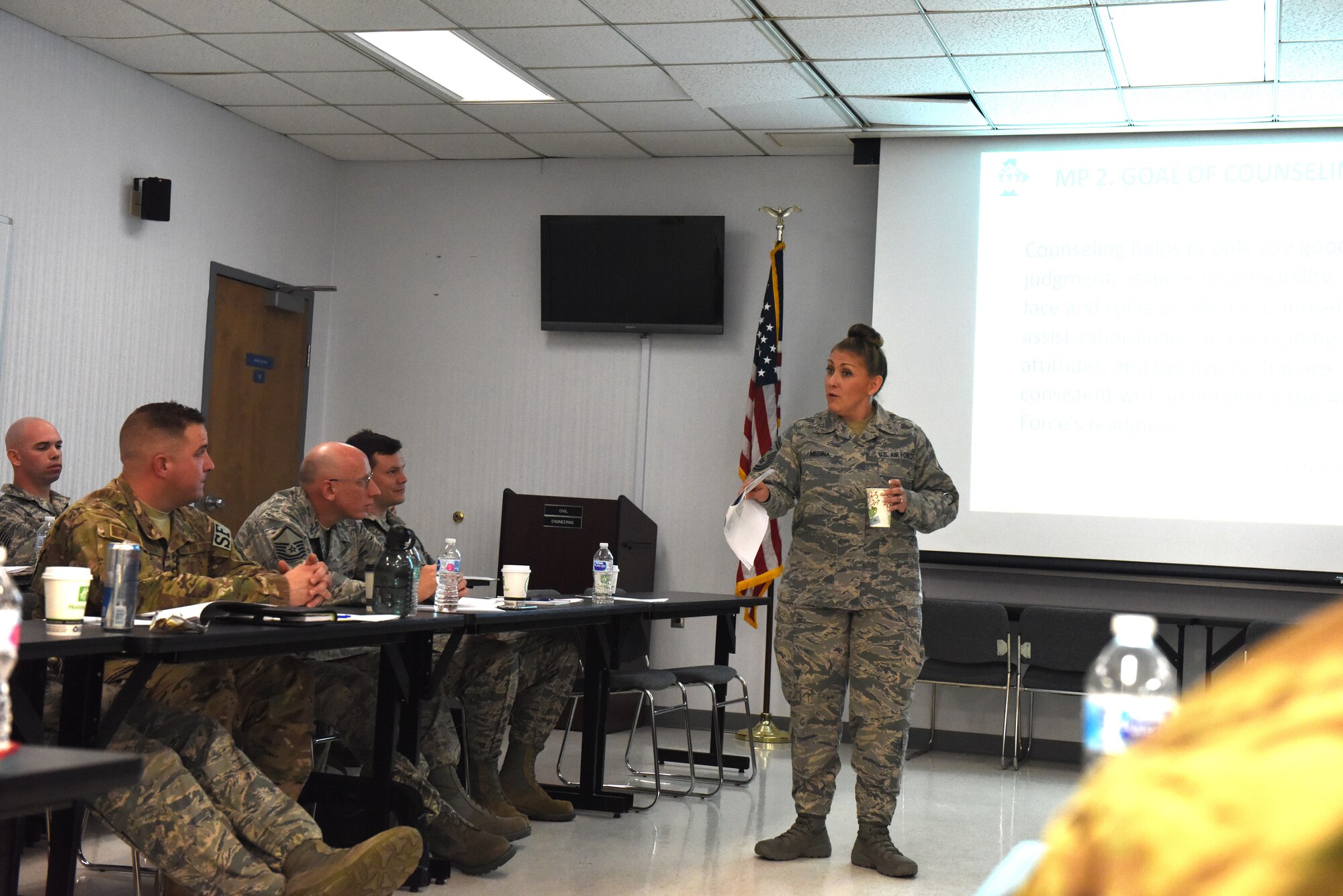 Master Sgt. Dana Pyles, 193rd Mission Support Group first sergeant, listens to Master Sgt. Jose Santiago, 193rd Special Operations Maintenance Group first sergeant, Lt Col Eric McKissick SOMXG deputy group commander, and Chief Master Sgt. Robert Smith, Special Operations Aircraft Maintenance Squadron superintendent talk about the importance of the leadership triad and how they handle issues as a triad, during a 2-day additional duty first sergeant seminar May 1-2, 2018, Middletown, Pennsylvania. The seminar was hosted by 193rd SOW first sergeant council and most briefings were taught by Air Force First Sergeant Academy instructors. (U.S. Air Force Photo by Master Sgt. Culeen Shaffer/Released)