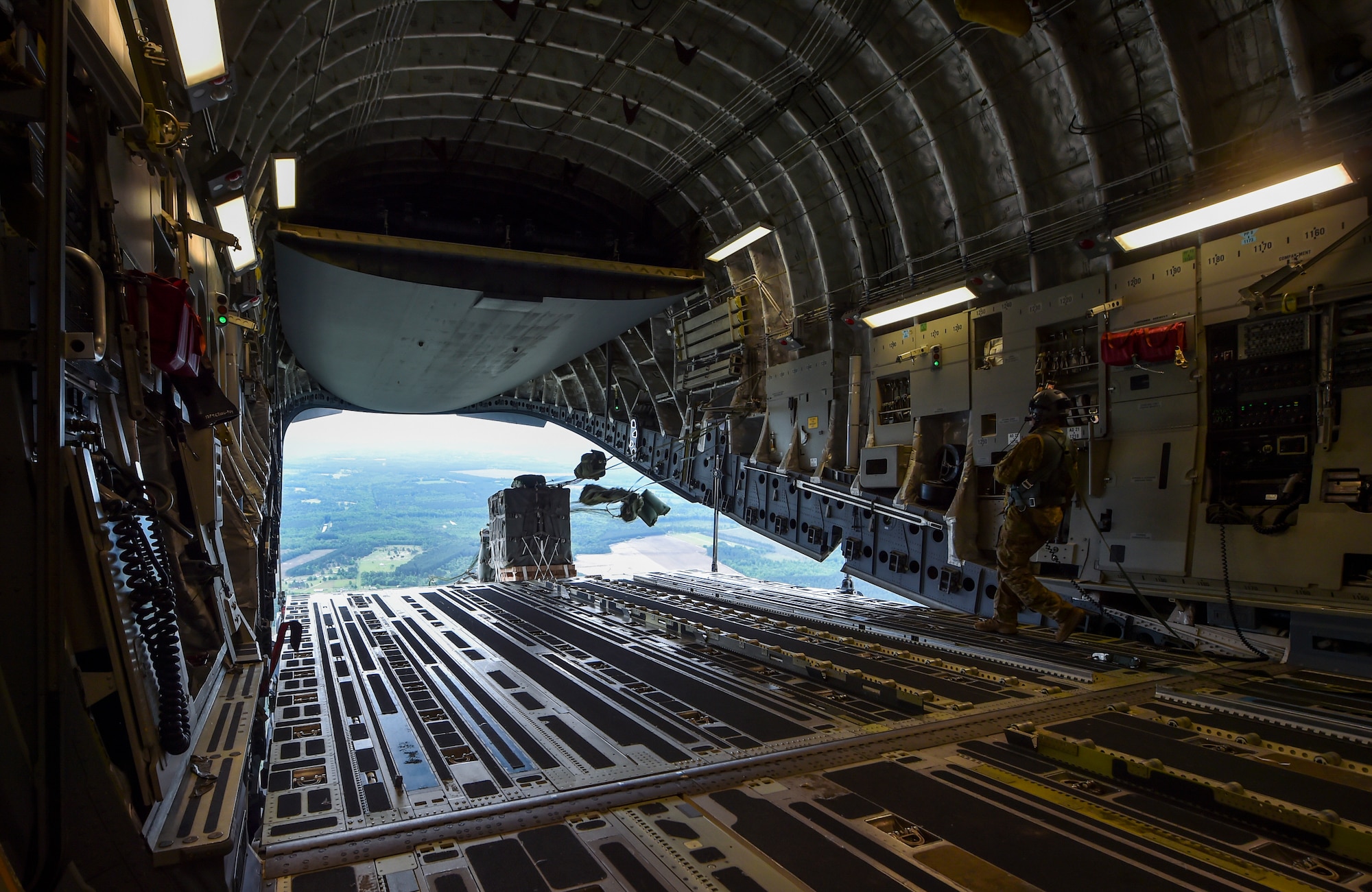 Cargo is dropped from a C-17 Globemaster III during the large formation exercise at Joint Base Charleston, S.C., May 22, 2018.