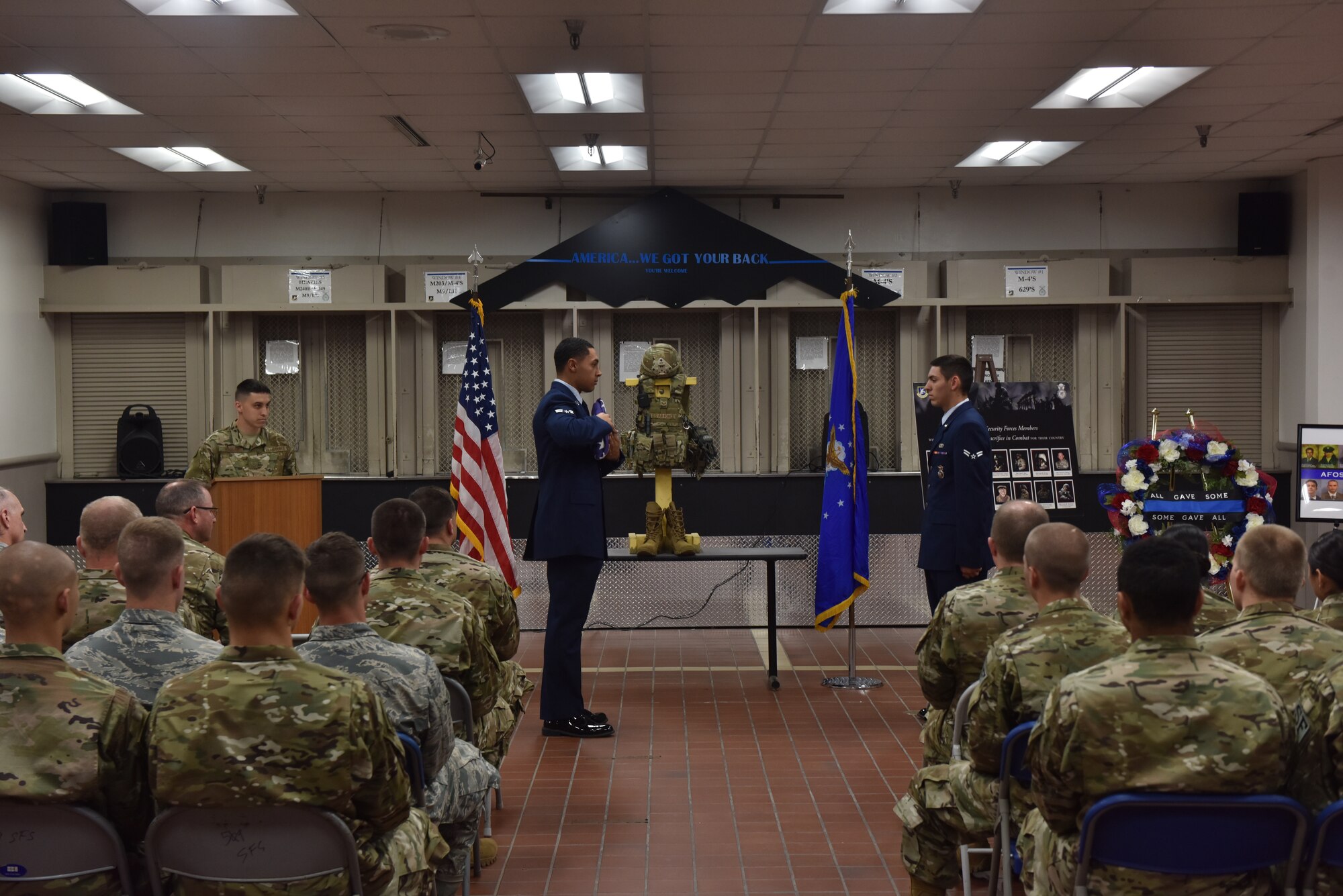 Members of Whiteman’s Honor Guard perform a flag folding ceremony during the closing ceremony of National Police Week May 17, 2018, at Whiteman Air Force Base, Mo.