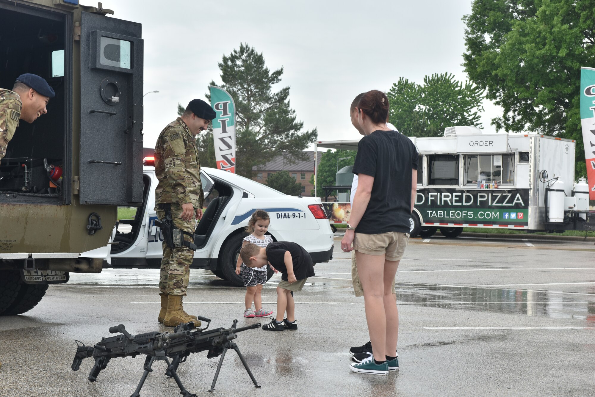 A response vehicle assigned to the 509th Security Forces Squadron has its lights flashed by a Whiteman youth during Police Week, May 17, 2018, at Whiteman Air Force Base, Mo.