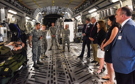 Senior officials from the Medical University of South Carolina receive a briefing from JB Charleston Airmen inside a C-17 Globemaster III May 22, 2018, at Joint Base Charleston, S.C.
