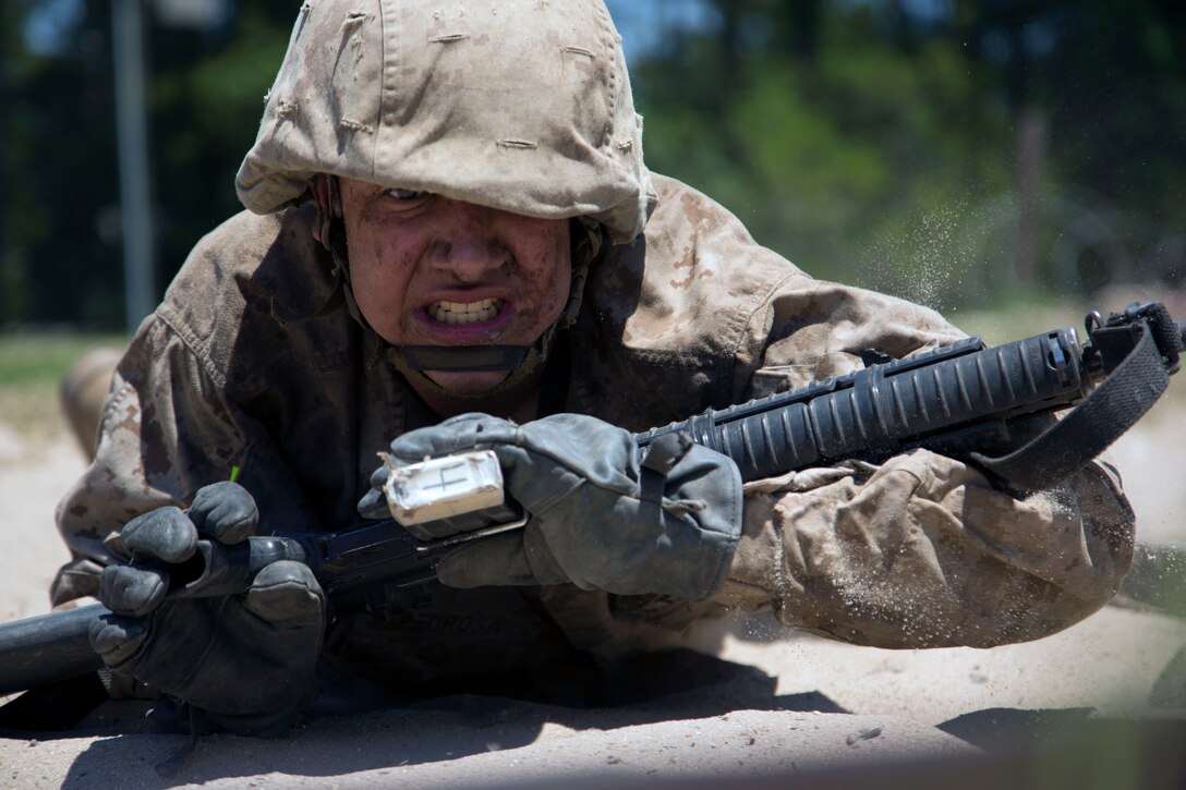 A Marine Corps recruit shows true grit getting through the Crucible training.