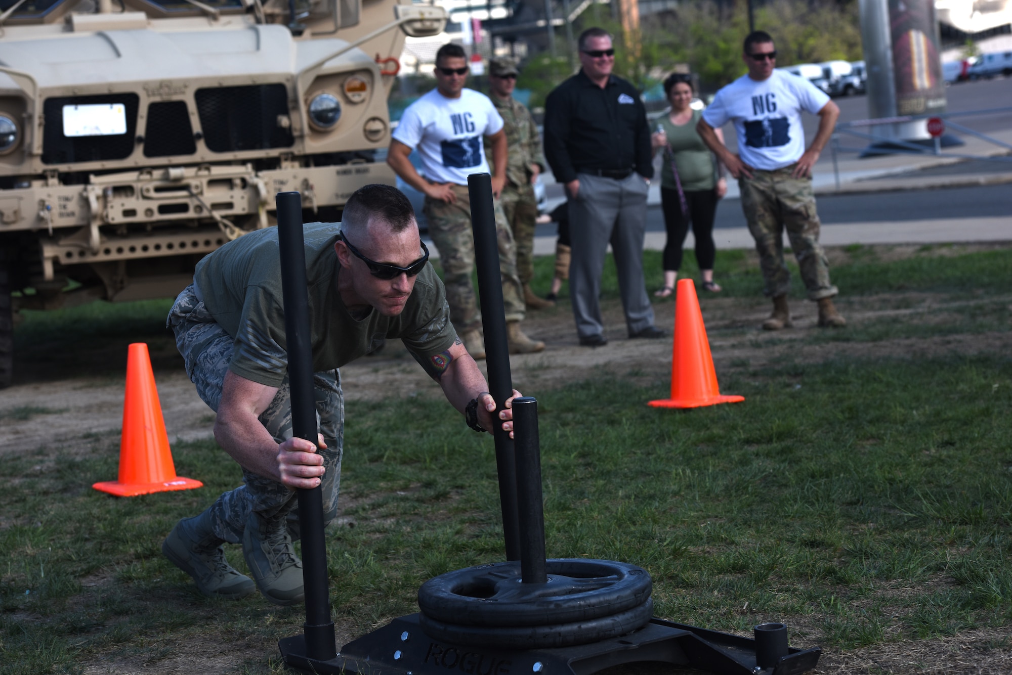 A five-man team from the 193rd Special Operations Security Forces Squadron competes in the inaugural Military and Pit Crew Challenge, in Philadelphia, Pennsylvania, Tuesday, May 8, 2018. The challenge was one of the third annual NASCAR XFINITY Philadelphia Takeover events brought to Philadelphia by Pocono Raceway, Dover International Speedway and Comcast to celebrate the sport in advance of upcoming races near at Pocono and Dover. (U.S. Air Force Photo by Master Sgt. Culeen Shaffer/Released)