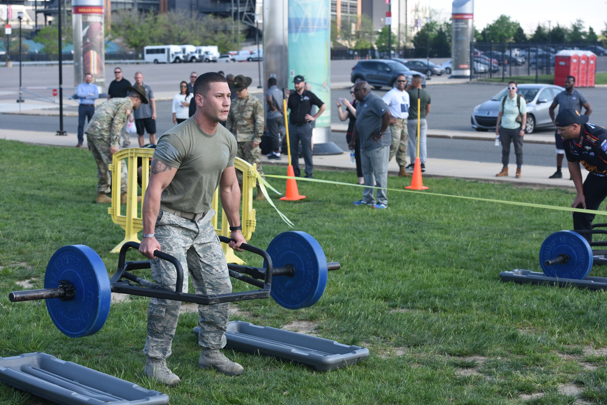 A five-man team from the 193rd Special Operations Security Forces Squadron competes in the inaugural Military and Pit Crew Challenge, in Philadelphia, Pennsylvania, Tuesday, May 8, 2018. The challenge was one of the third annual NASCAR XFINITY Philadelphia Takeover events brought to Philadelphia by Pocono Raceway, Dover International Speedway and Comcast to celebrate the sport in advance of upcoming races near at Pocono and Dover. (U.S. Air Force Photo by Master Sgt. Culeen Shaffer/Released)