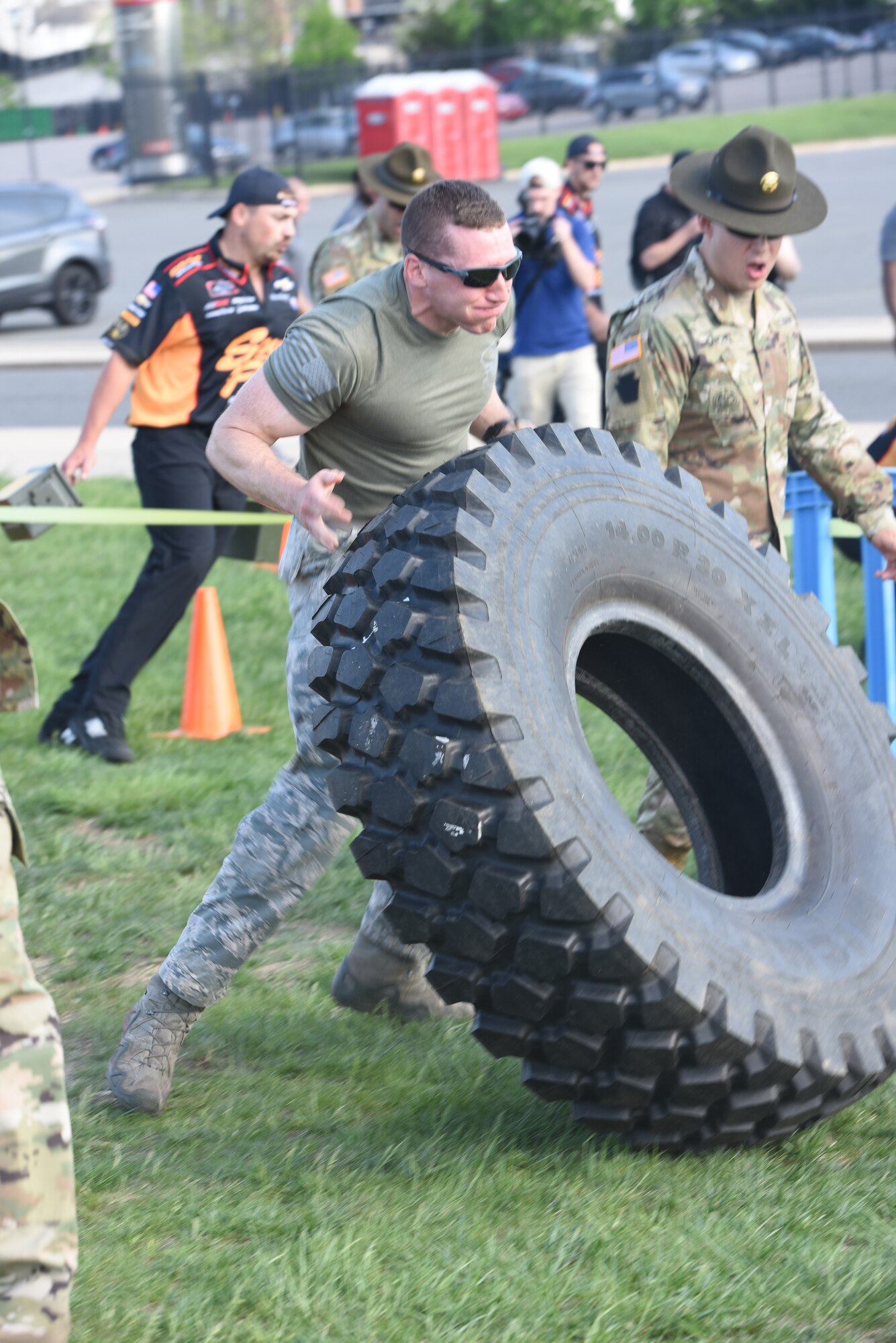 A five-man team from the 193rd Special Operations Security Forces Squadron competes in the inaugural Military and Pit Crew Challenge, in Philadelphia, Pennsylvania, Tuesday, May 8, 2018. The challenge was one of the third annual NASCAR XFINITY Philadelphia Takeover events brought to Philadelphia by Pocono Raceway, Dover International Speedway and Comcast to celebrate the sport in advance of upcoming races near at Pocono and Dover. (U.S. Air Force Photo by Master Sgt. Culeen Shaffer/Released)